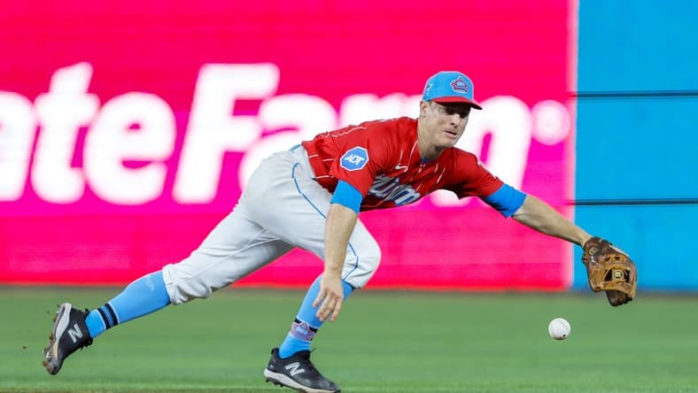 Apr 1, 2023; Miami, Florida, USA; Miami Marlins shortstop Joey Wendle (18) dives but cannot catch a base hit from New York Mets catcher Omar Narvaez (not pictured) during the eighth inning at loanDepot Park. Mandatory Credit: Sam Navarro-USA TODAY Sports