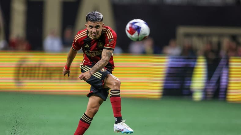 Apr 1, 2023; Atlanta, Georgia, USA; Atlanta United midfielder Thiago Almada (23) takes a free kick against the New York Red Bulls in the first half at Mercedes-Benz Stadium. Mandatory Credit: Brett Davis-USA TODAY Sports