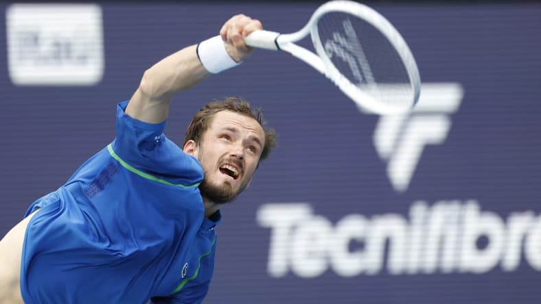 Apr 2, 2023; Miami, Florida, US; Daniil Medvedev serves against Jannik Sinner (ITA) (not pictured) in the men's singles final on day fourteen of the Miami Open at Hard Rock Stadium. Mandatory Credit: Geoff Burke-USA TODAY Sports
