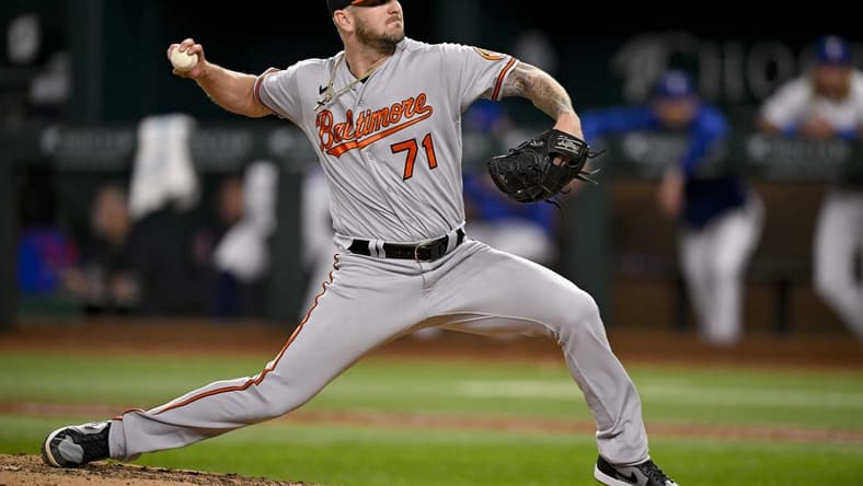 Apr 4, 2023; Arlington, Texas, USA; Baltimore Orioles relief pitcher Logan Gillaspie (71) pitches against the Texas Rangers during the game at Globe Life Field. Mandatory Credit: Jerome Miron-USA TODAY Sports