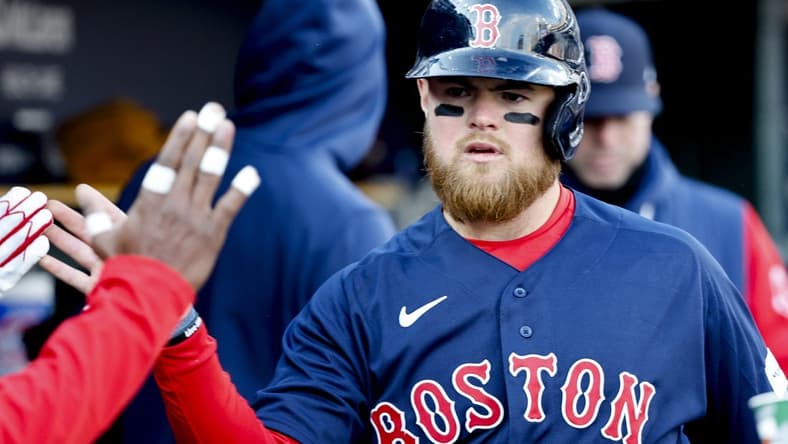 Apr 8, 2023; Detroit, Michigan, USA; Boston Red Sox second baseman Christian Arroyo (39) receives congratulations from teammates after scoring in the eighth inning against the Detroit Tigers at Comerica Park. Mandatory Credit: Rick Osentoski-USA TODAY Sports