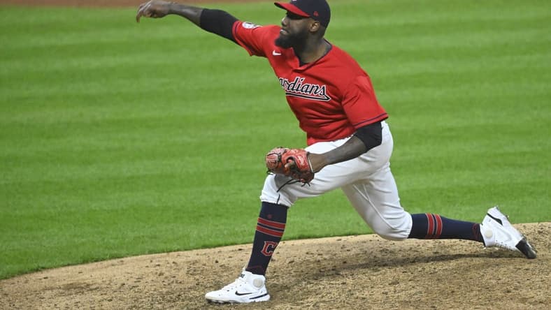 Apr 8, 2023; Cleveland, Ohio, USA; Cleveland Guardians relief pitcher Enyel De Los Santos (62) delivers a pitch in the eighth inning against the Seattle Mariners at Progressive Field. Mandatory Credit: David Richard-USA TODAY Sports