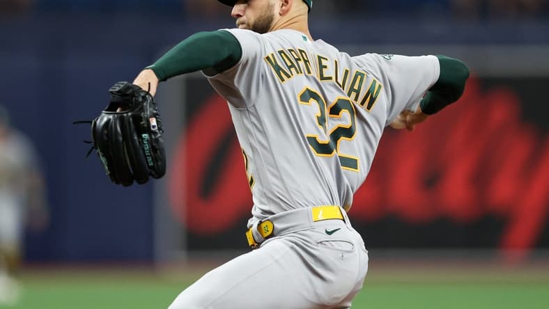Apr 9, 2023; St. Petersburg, Florida, USA;  Oakland Athletics starting pitcher James Kaprielian (32) throws a pitch against the Tampa Bay Rays in the third inning at Tropicana Field. Mandatory Credit: Nathan Ray Seebeck-USA TODAY Sports