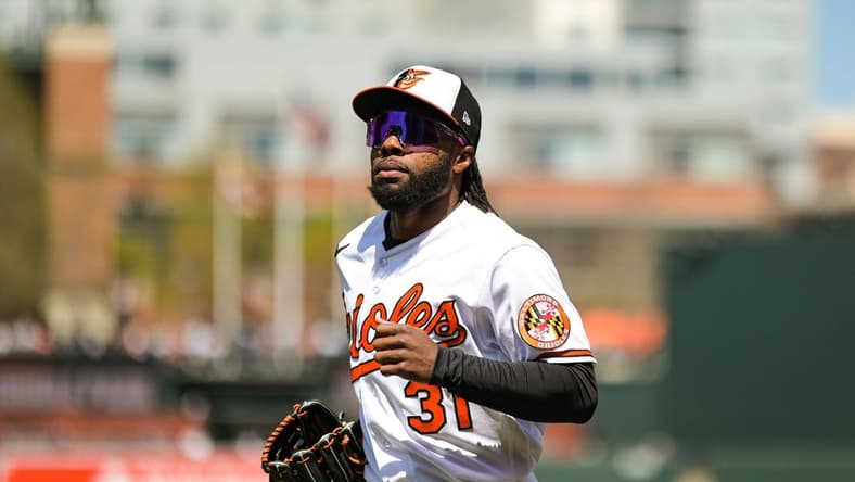 Apr 8, 2023; Baltimore, Maryland, USA; Baltimore Orioles center fielder Cedric Mullins (31) run to the dugout before the game against the New York Yankees at Oriole Park at Camden Yards. Mandatory Credit: Tommy Gilligan-USA TODAY Sports