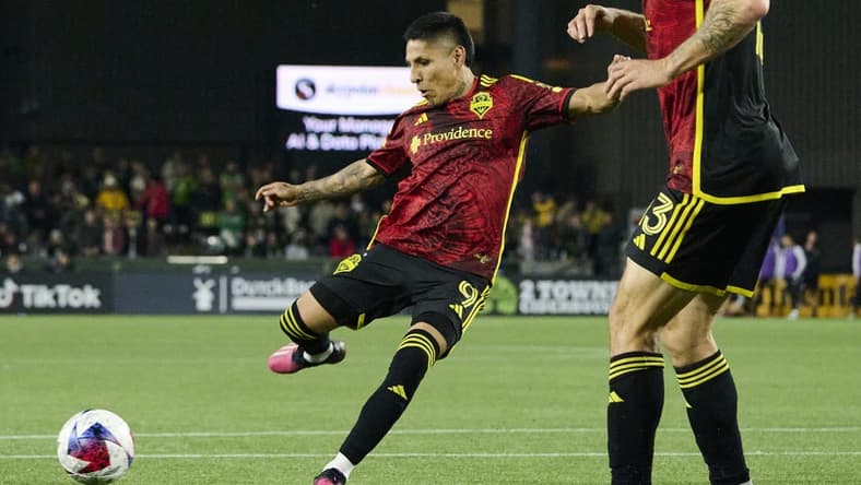 Apr 15, 2023; Portland, Oregon, USA;  Seattle Sounders forward Raul Ruidiaz (9) scores a goal during the second half against the Portland Timbers at Providence Park. Mandatory Credit: Troy Wayrynen-USA TODAY Sports