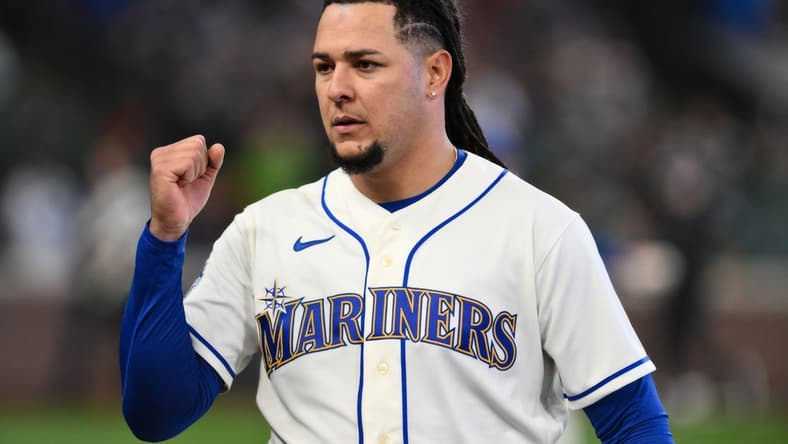 Apr 16, 2023; Seattle, Washington, USA; Seattle Mariners starting pitcher Luis Castillo (58) celebrates after the final out of the seventh inning against the Colorado Rockies at T-Mobile Park. Mandatory Credit: Steven Bisig-USA TODAY Sports