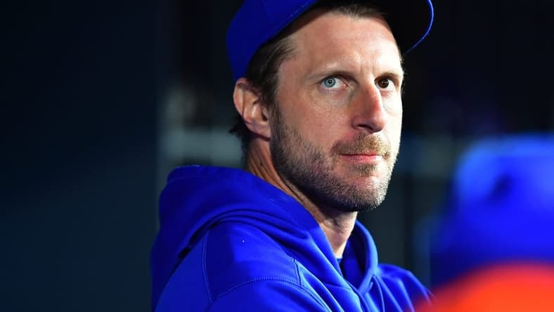 Apr 17, 2023; Los Angeles, California, USA; New York Mets starting pitcher Max Scherzer (21) watches game action against the Los Angeles Dodgers during the ninth inning at Dodger Stadium. Mandatory Credit: Gary A. Vasquez-USA TODAY Sports