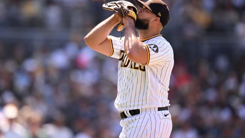 Apr 19, 2023; San Diego, California, USA; San Diego Padres relief pitcher Luis Garcia (66) walks to the dugout after being replaced during the eighth inning against the Atlanta Braves at Petco Park. Mandatory Credit: Orlando Ramirez-USA TODAY Sports