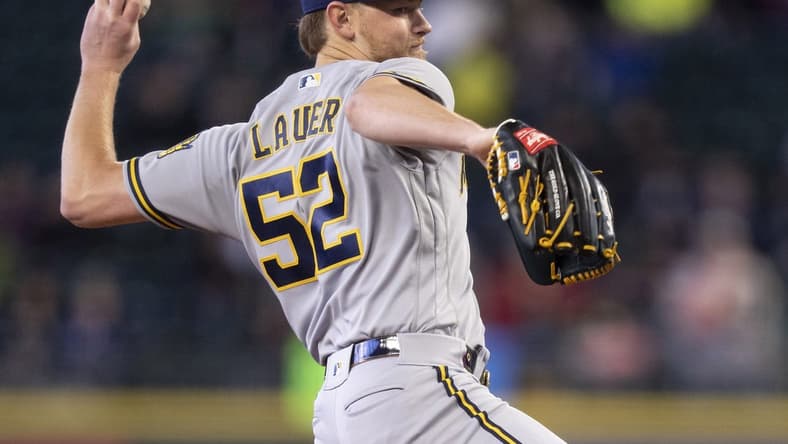 Apr 19, 2023; Seattle, Washington, USA; Milwaukee Brewers starter Eric Lauer (52) delivers a pitch during the fifth inning against the Seattle Mariners at T-Mobile Park. Mandatory Credit: Stephen Brashear-USA TODAY Sports