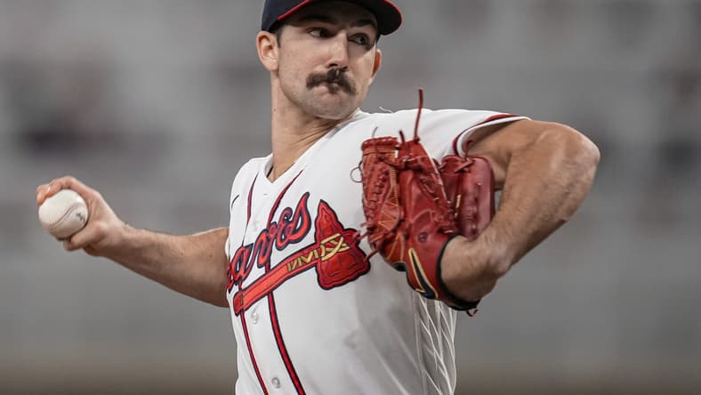 Apr 24, 2023; Cumberland, Georgia, USA; Atlanta Braves starting pitcher Spencer Strider (99) pitches against the Miami Marlins during the seventh inning at Truist Park. Mandatory Credit: Dale Zanine-USA TODAY Sports
