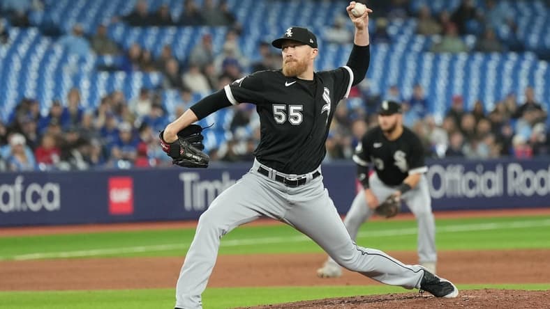 Apr 24, 2023; Toronto, Ontario, CAN; Chicago White Sox relief pitcher Jake Diekman (55) throws a pitch against the Toronto Blue Jays during the seventh inning at Rogers Centre. Mandatory Credit: Nick Turchiaro-USA TODAY Sports