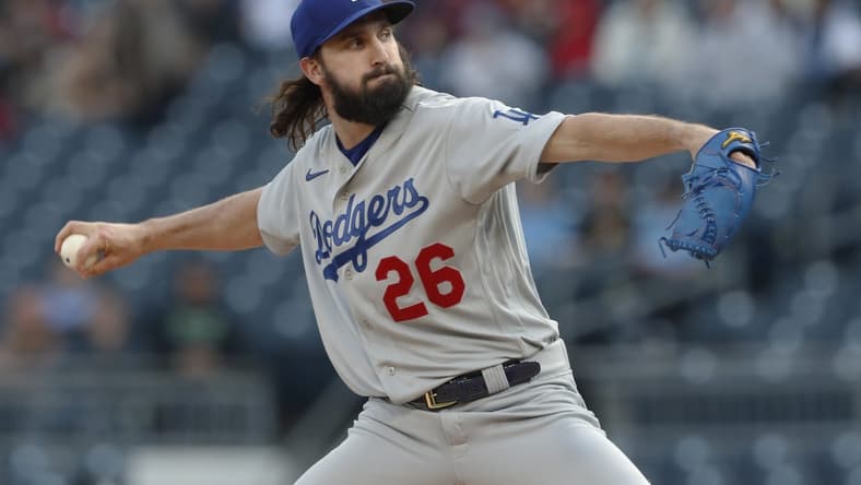 Apr 26, 2023; Pittsburgh, Pennsylvania, USA;  Los Angeles Dodgers starting pitcher Tony Gonsolin (26) delivers a pitch against the Pittsburgh Pirates during the first inning at PNC Park. Mandatory Credit: Charles LeClaire-USA TODAY Sports