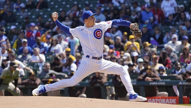 Apr 27, 2023; Chicago, Illinois, USA; Chicago Cubs starting pitcher Hayden Wesneski (19) throws against the San Diego Padres during the first inning at Wrigley Field. Mandatory Credit: David Banks-USA TODAY Sports