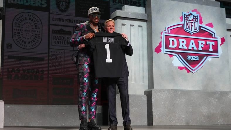 Apr 27, 2023; Kansas City, MO, USA; Texas Tech defensive end Tyree Wilson with NFL commissioner Roger Goodell after being selected by the Las Vegas Raiders seventh overall in the first round of the 2023 NFL Draft at Union Station. Mandatory Credit: Kirby Lee-USA TODAY Sports