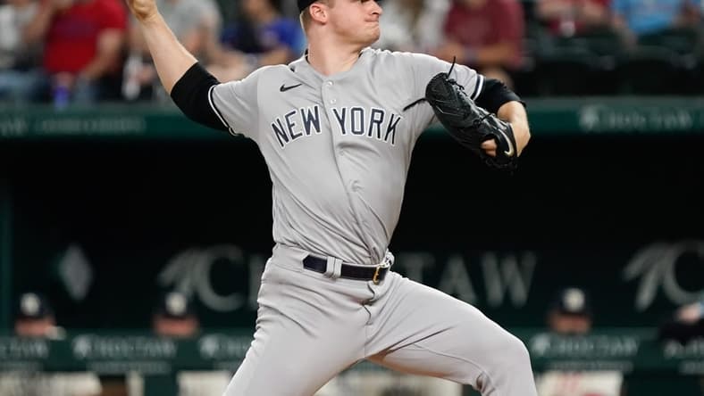 Apr 28, 2023; Arlington, Texas, USA; New York Yankees starting pitcher Clarke Schmidt (36) throws to the plate  against the Texas Rangers during the first inning at Globe Life Field. Mandatory Credit: Raymond Carlin III-USA TODAY Sports