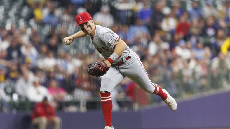Apr 28, 2023; Milwaukee, Wisconsin, USA;  Los Angeles Angels shortstop Zach Neto (9) throws to first base during the fifth inning against the Milwaukee Brewers at American Family Field. Mandatory Credit: Jeff Hanisch-USA TODAY Sports