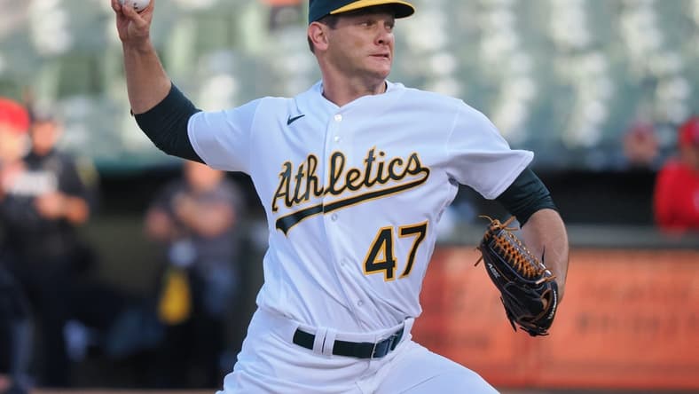 Apr 28, 2023; Oakland, California, USA; Oakland Athletics starting pitcher Drew Rucinski (47) pitches the ball against the Cincinnati Reds during the first inning at Oakland Coliseum. Mandatory Credit: Kelley L Cox-USA TODAY Sports