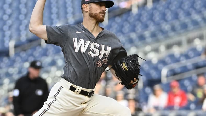 Apr 29, 2023; Washington, District of Columbia, USA; Washington Nationals starting pitcher Chad Kuhl (26) throws to the Pittsburgh Pirates during the first inning at Nationals Park. Mandatory Credit: Brad Mills-USA TODAY Sports