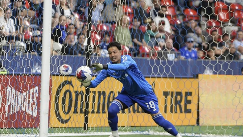 Apr 29, 2023; Vancouver, British Columbia, CAN;  Vancouver Whitecaps FC goalkeeper Yohei Takaoka (18) stops a shot on net by the Colorado Rapids during the second half at BC Place. Mandatory Credit: Anne-Marie Sorvin-USA TODAY Sports