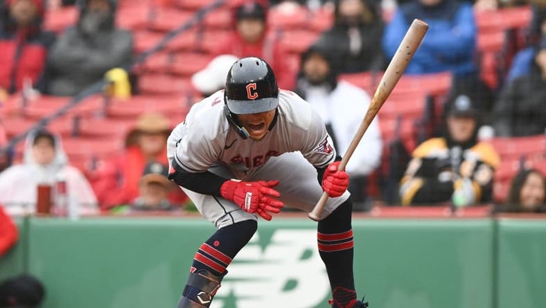 Apr 30, 2023; Boston, Massachusetts, USA; Cleveland Guardians second baseman Andres Gimenez (0) is hit by a pitch thrown by Boston Red Sox starting pitcher Chris Sale (41) during the fifth inning at Fenway Park. Mandatory Credit: Brian Fluharty-USA TODAY Sports