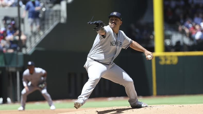 Apr 30, 2023; Arlington, Texas, USA; New York Yankees starting pitcher Nestor Cortes (65) throws during the first inning against the Texas Rangers at Globe Life Field. Mandatory Credit: Kevin Jairaj-USA TODAY Sports