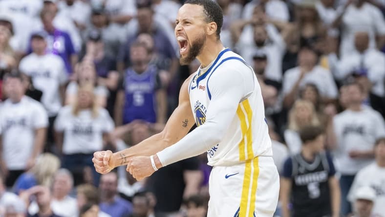 April 30, 2023; Sacramento, California, USA; Golden State Warriors guard Stephen Curry (30) celebrates against the Sacramento Kings during the third quarter in game seven of the 2023 NBA playoffs first round at Golden 1 Center. Mandatory Credit: Kyle Terada-USA TODAY Sports