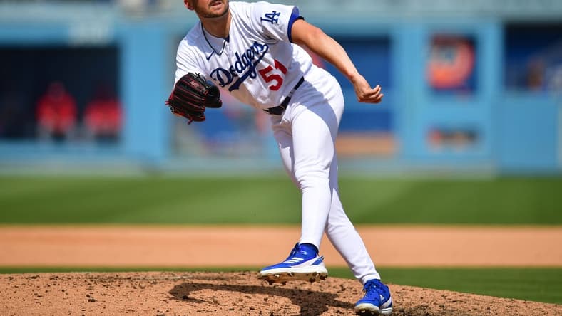 Apr 30, 2023; Los Angeles, California, USA; Los Angeles Dodgers relief pitcher Alex Vesia (51) throws against the St. Louis Cardinals during the seventh inning at Dodger Stadium. Mandatory Credit: Gary A. Vasquez-USA TODAY Sports