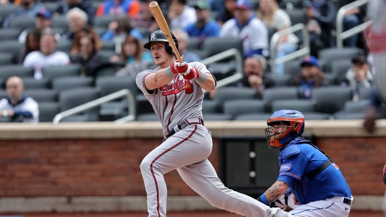 May 1, 2023; New York City, New York, USA; Atlanta Braves catcher Sean Murphy (12) follows through on a three run home run against the New York Mets during the first inning at Citi Field. Mandatory Credit: Brad Penner-USA TODAY Sports