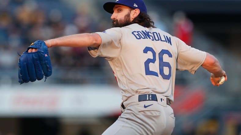 Apr 26, 2023; Pittsburgh, Pennsylvania, USA; Los Angeles Dodgers starting pitcher Tony Gonsolin (26) pitches against the Pittsburgh Pirates during the fourth inning at PNC Park. Mandatory Credit: Charles LeClaire-USA TODAY Sports