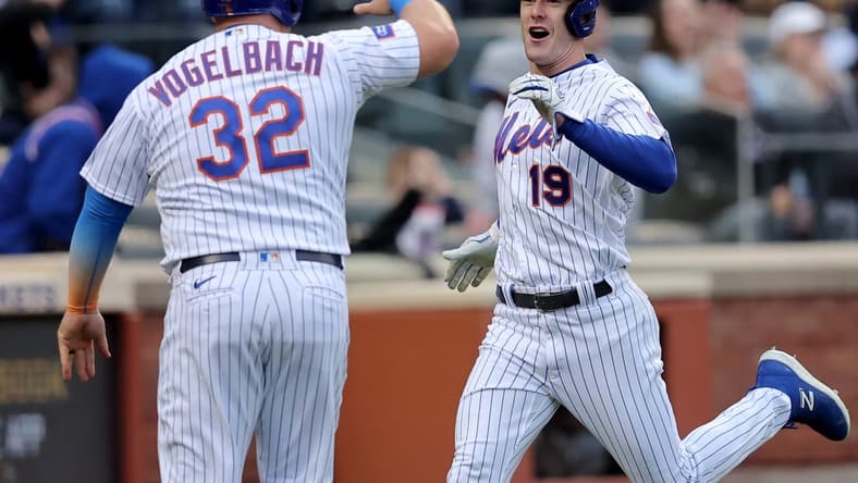 May 1, 2023; New York City, New York, USA; New York Mets left fielder Mark Canha (19) and designated hitter Daniel Vogelbach (32) react after scoring against the Atlanta Braves on a double by catcher Francisco Alvarez (not pictured) during the sixth inning at Citi Field. Mandatory Credit: Brad Penner-USA TODAY Sports