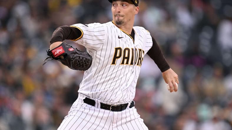 May 1, 2023; San Diego, California, USA; San Diego Padres starting pitcher Blake Snell (4) throws a pitch against the Cincinnati Reds during the first inning at Petco Park. Mandatory Credit: Orlando Ramirez-USA TODAY Sports