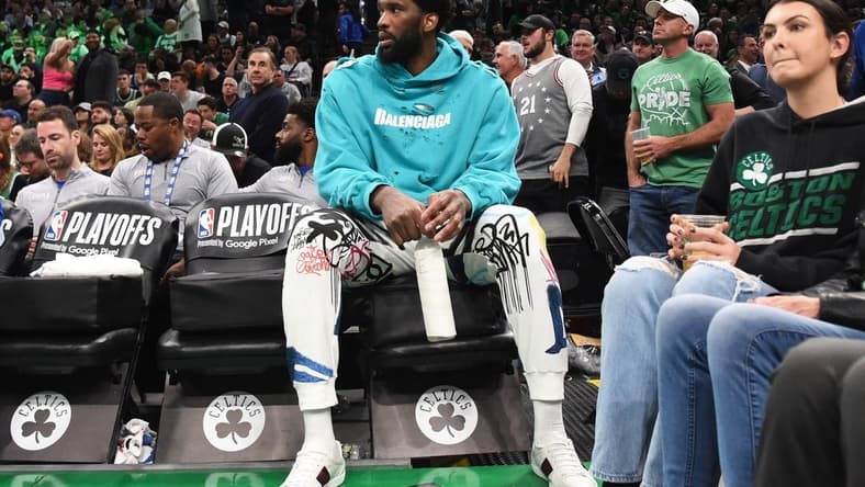 May 1, 2023; Boston, Massachusetts, USA; Injured Philadelphia 76ers center Joel Embiid (21) watches the action in the first half during game one of the 2023 NBA playoffs against the Boston Celtics at TD Garden. Mandatory Credit: Bob DeChiara-USA TODAY Sports