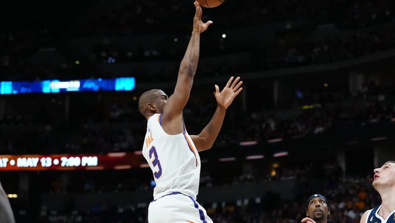 May 1, 2023; Denver, Colorado, USA; Phoenix Suns guard Chris Paul (3) shoots the ball in the first half against the Denver Nuggets during game two of the 2023 NBA playoffs at Ball Arena. Mandatory Credit: Ron Chenoy-USA TODAY Sports