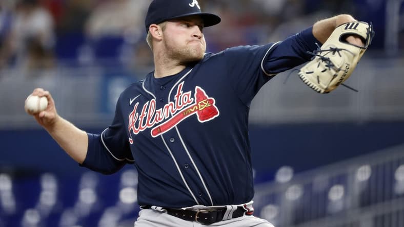 May 2, 2023; Miami, Florida, USA; Atlanta Braves starting pitcher Bryce Elder (55) pitches against the Miami Marlins during the first inning at loanDepot Park. Mandatory Credit: Rhona Wise-USA TODAY Sports