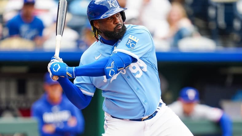 Apr 19, 2023; Kansas City, Missouri, USA; Kansas City Royals right fielder Franmil Reyes (99) bats during the sixth inning against the Texas Rangers at Kauffman Stadium. Mandatory Credit: Jay Biggerstaff-USA TODAY Sports