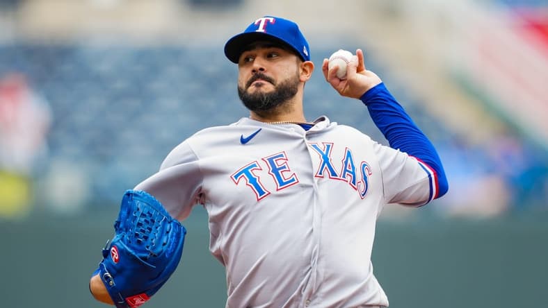 Apr 19, 2023; Kansas City, Missouri, USA; Texas Rangers starting pitcher Martin Perez (54) warms up during the first inning against the Kansas City Royals at Kauffman Stadium. Mandatory Credit: Jay Biggerstaff-USA TODAY Sports