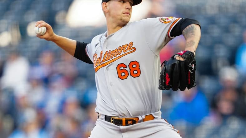 May 2, 2023; Kansas City, Missouri, USA; Baltimore Orioles starting pitcher Tyler Wells (68) pitches during the first inning against the Kansas City Royals at Kauffman Stadium. Mandatory Credit: Jay Biggerstaff-USA TODAY Sports