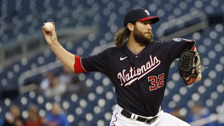May 2, 2023; Washington, District of Columbia, USA; Washington Nationals starting pitcher Trevor Williams (32) pitches against the Chicago Cubs during the third inning at Nationals Park. Mandatory Credit: Geoff Burke-USA TODAY Sports