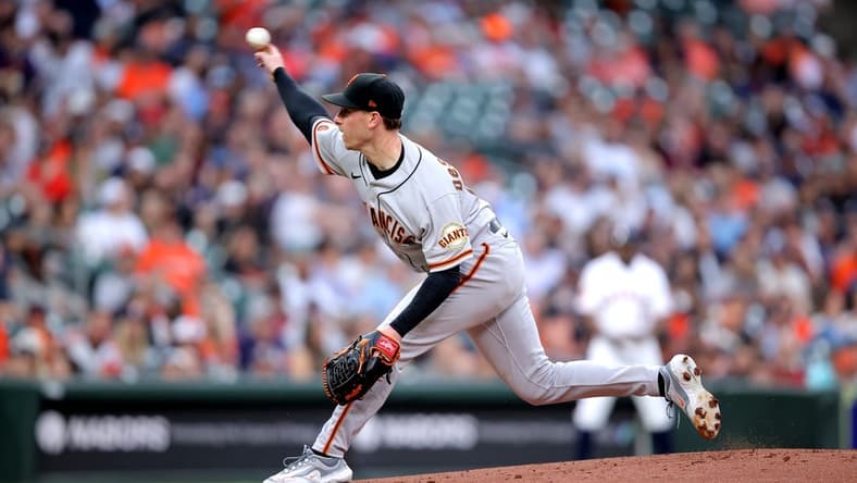 May 2, 2023; Houston, Texas, USA; San Francisco Giants starting pitcher Anthony DeSclafani (26) delivers a pitch against the Houston Astros during the first inning at Minute Maid Park. Mandatory Credit: Erik Williams-USA TODAY Sports