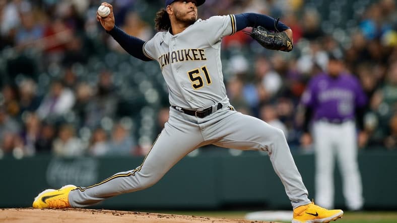 May 2, 2023; Denver, Colorado, USA; Milwaukee Brewers starting pitcher Freddy Peralta (51) pitches in the first inning against the Colorado Rockies at Coors Field. Mandatory Credit: Isaiah J. Downing-USA TODAY Sports