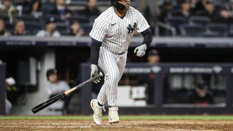 May 2, 2023; Bronx, New York, USA;  New York Yankees designated hitter Willie Calhoun (24) hits a home run in the seventh inning against the Cleveland Guardians at Yankee Stadium. Mandatory Credit: Wendell Cruz-USA TODAY Sports