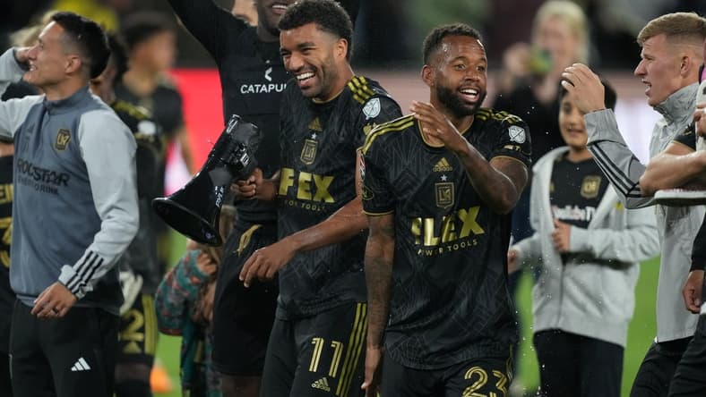 May 2, 2023; Los Angeles, CA, USA; LAFC midfielder Timothy Tillman (11) and midfielder Kellyn Acosta (23) celebrate after the game against the Philadelphia Union BMO Stadium. Mandatory Credit: Kirby Lee-USA TODAY Sports