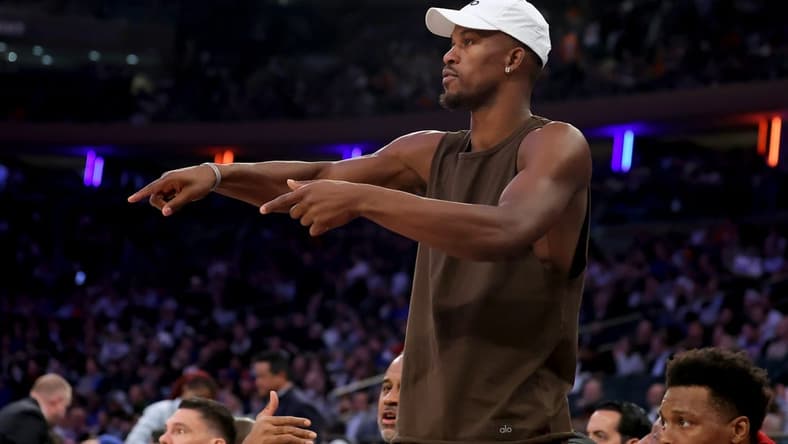 May 2, 2023; New York, New York, USA; Miami Heat injured forward Jimmy Butler (22) talks to his teammates from the bench during the third quarter of game two of the 2023 NBA Eastern Conference semifinal playoffs against the New York Knicks at Madison Square Garden. Mandatory Credit: Brad Penner-USA TODAY Sports