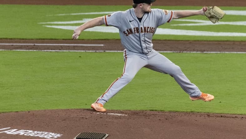 May 3, 2023; Houston, Texas, USA;  San Francisco Giants starting pitcher Logan Webb (62) throws against the Houston Astros in the third inning at Minute Maid Park. Mandatory Credit: Thomas Shea-USA TODAY Sports