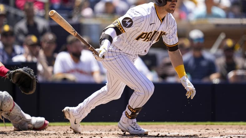May 3, 2023; San Diego, California, USA;  San Diego Padres catcher Brett Sullivan (29) hits an RBI double against the Cincinnati Reds during the second inning at Petco Park. Mandatory Credit: Ray Acevedo-USA TODAY Sports
