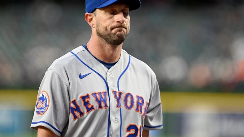 May 3, 2023; Detroit, Michigan, USA; New York Mets starting pitcher Max Scherzer (21) walks off the field after giving up six runs in 3 1/3 innings against the Detroit Tigers at Comerica Park. It was Scherzer's first game back after serving a ten game suspension. Credit: Lon Horwedel-USA TODAY Sports