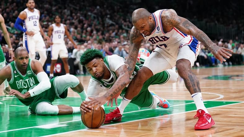 May 3, 2023; Boston, Massachusetts, USA; Boston Celtics guard Marcus Smart (36) works for the ball against Philadelphia 76ers forward P.J. Tucker (17) in the first quarter during game two of the 2023 NBA playoffs at TD Garden. Mandatory Credit: David Butler II-USA TODAY Sports