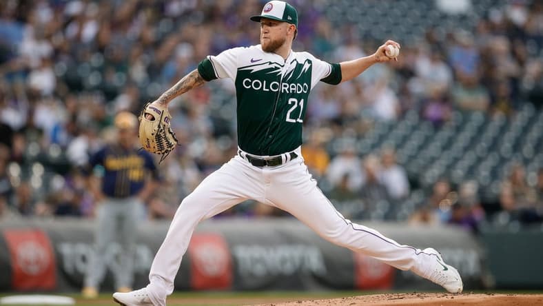 May 3, 2023; Denver, Colorado, USA; Colorado Rockies starting pitcher Kyle Freeland (21) pitches in the second inning against the Milwaukee Brewers at Coors Field. Mandatory Credit: Isaiah J. Downing-USA TODAY Sports