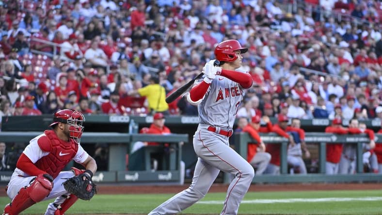 May 3, 2023; St. Louis, Missouri, USA;  Los Angeles Angels starting pitcher Shohei Ohtani (17) hits a single against the St. Louis Cardinals during the first inning at Busch Stadium. Mandatory Credit: Jeff Curry-USA TODAY Sports