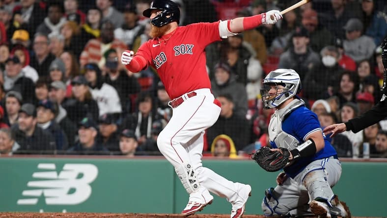 May 3, 2023; Boston, Massachusetts, USA; Boston Red Sox designated hitter Justin Turner (2) loads the bases against the Toronto Blue Jays during the fifth inning at Fenway Park. Mandatory Credit: Eric Canha-USA TODAY Sports